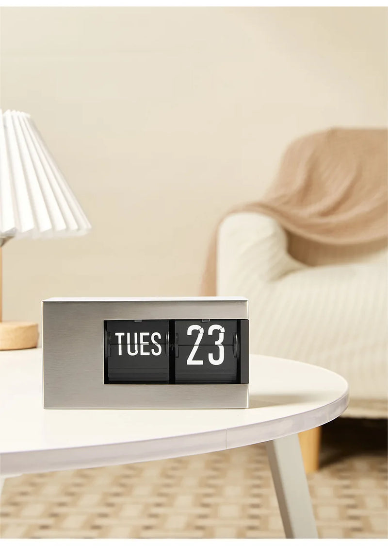 The Perpetual Executive Calendar Clock
Minimalist Flip Timepiece with Integrated Date Display