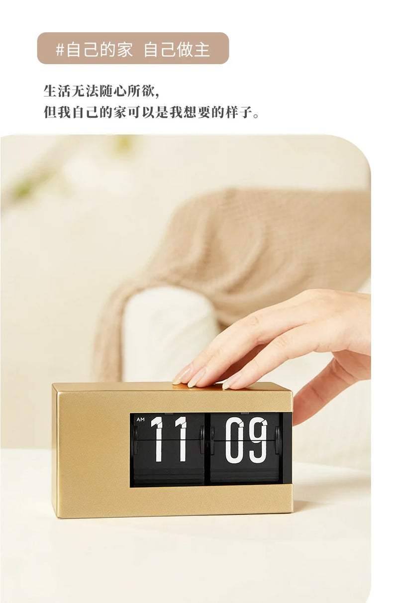 The Perpetual Executive Calendar Clock
Minimalist Flip Timepiece with Integrated Date Display