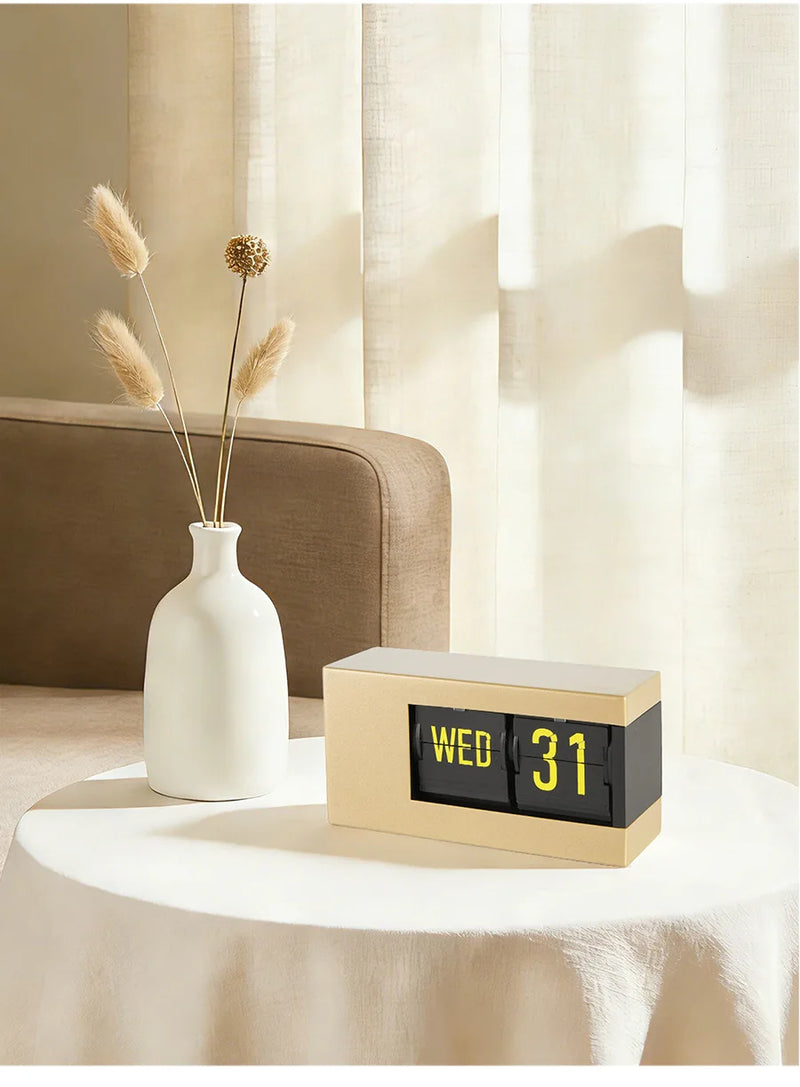 The Perpetual Executive Calendar Clock
Minimalist Flip Timepiece with Integrated Date Display