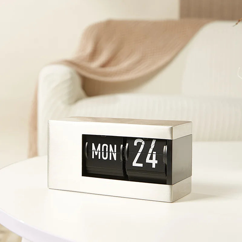 The Perpetual Executive Calendar Clock
Minimalist Flip Timepiece with Integrated Date Display