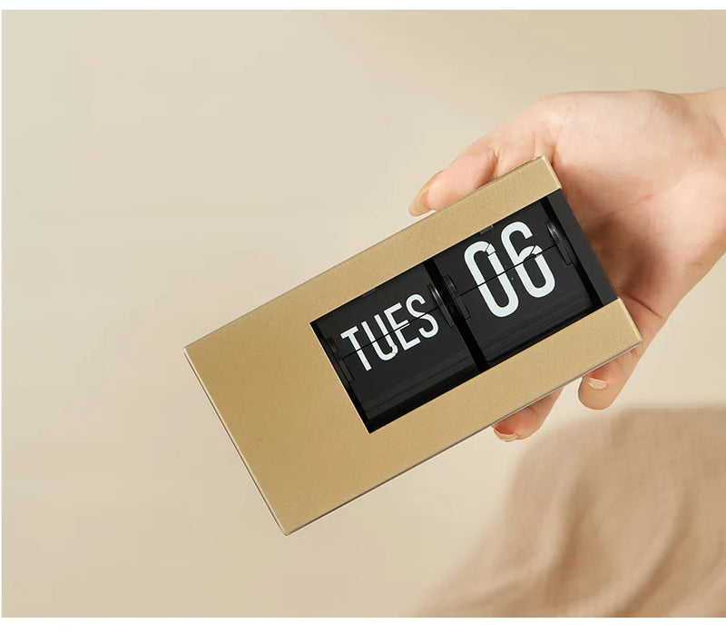 The Perpetual Executive Calendar Clock
Minimalist Flip Timepiece with Integrated Date Display