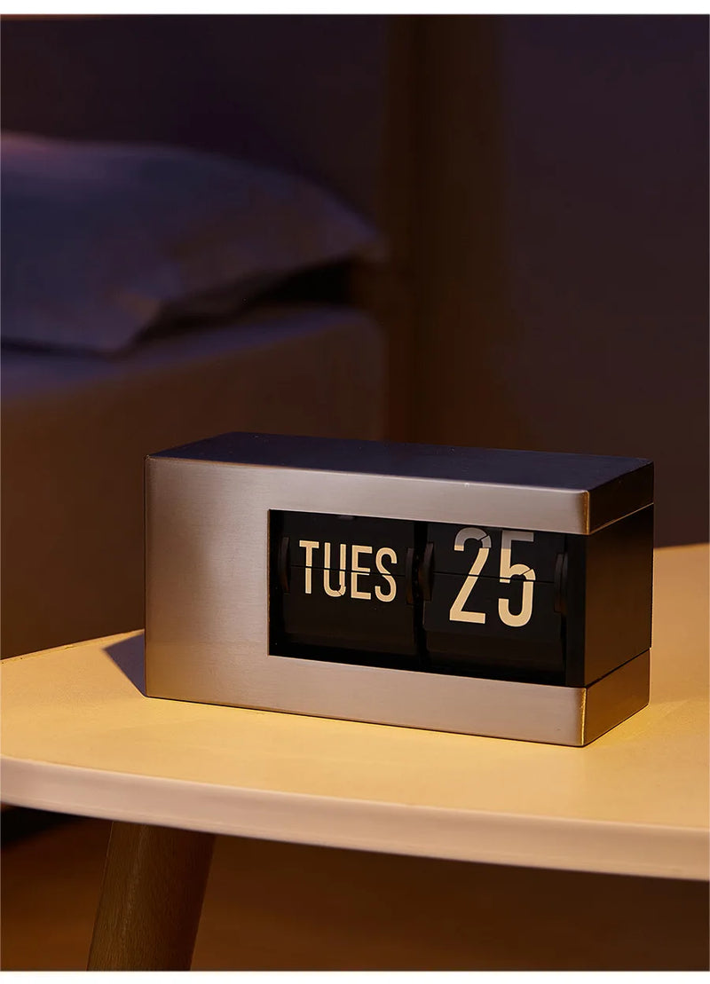 The Perpetual Executive Calendar Clock
Minimalist Flip Timepiece with Integrated Date Display